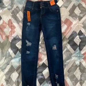 Dark blue skinny jeans. Size 3